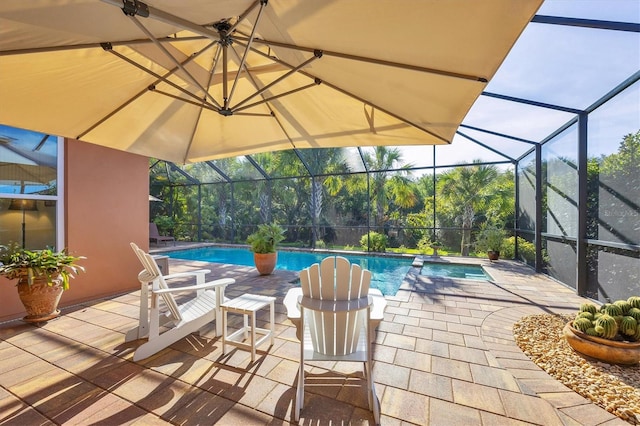 view of pool featuring a lanai and a patio area