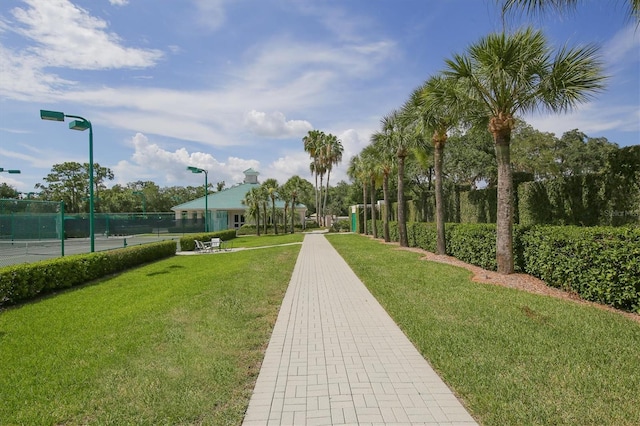 view of home's community featuring a yard