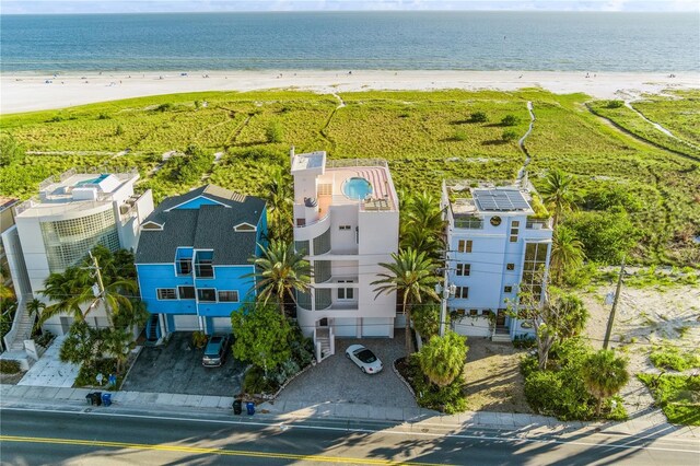 drone / aerial view with a view of the beach and a water view