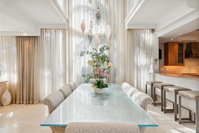 dining room with tile patterned flooring