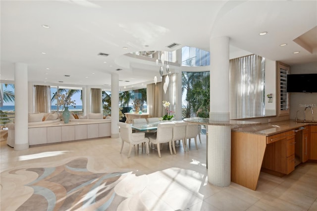 dining room with plenty of natural light, visible vents, and recessed lighting