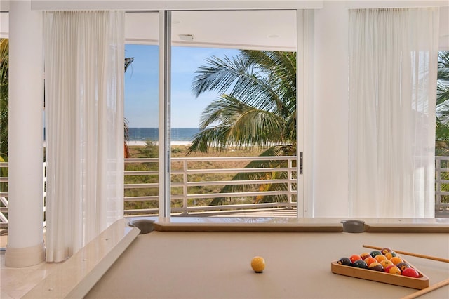 doorway featuring a water view and billiards