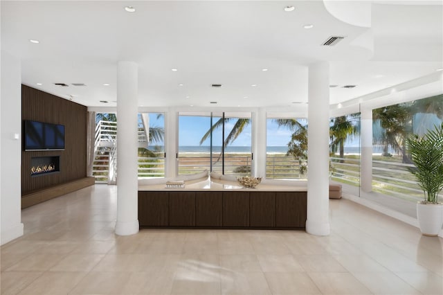 648 Beach Rd, Sarasota, FL 34242 - bathroom featuring recessed lighting, a large fireplace, and tile patterned flooring