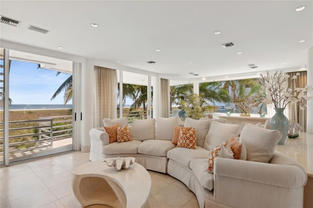 648 Beach Rd, Sarasota, FL 34242 - living area with light tile patterned floors and recessed lighting