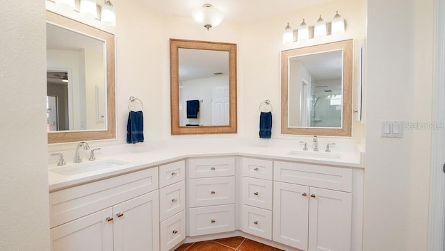 bathroom featuring tile patterned floors and vanity