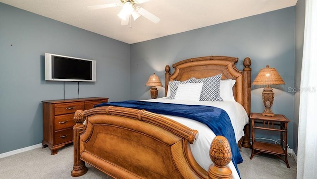 bedroom featuring ceiling fan and light colored carpet