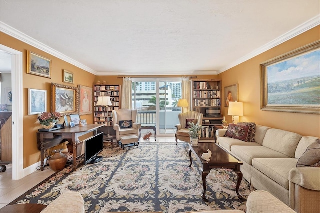 living area featuring baseboards and crown molding