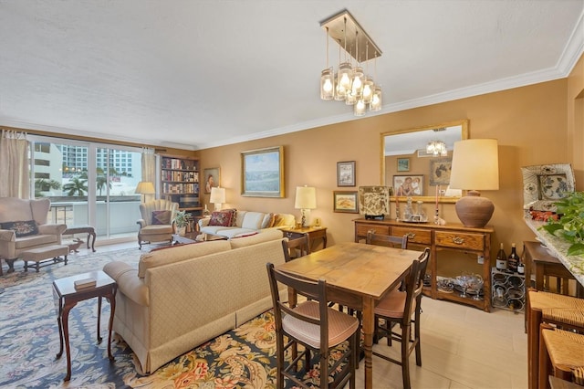 dining space featuring ornamental molding and a chandelier