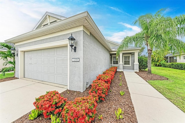 single story home featuring a garage and a front lawn