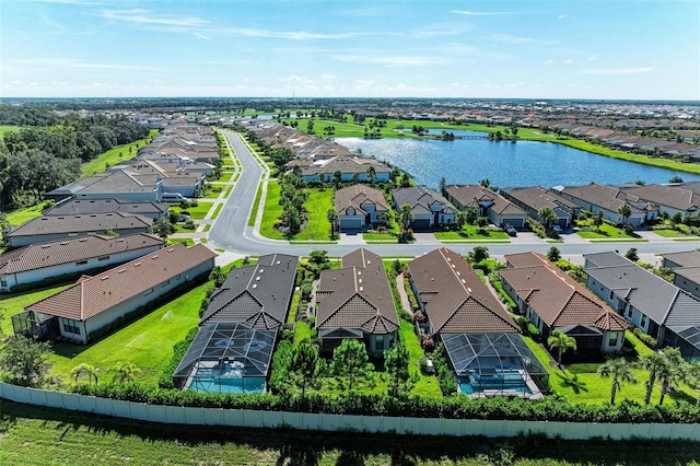 drone / aerial view with a water view