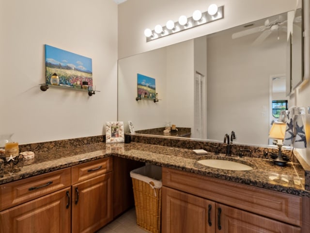 bathroom featuring vanity and ceiling fan