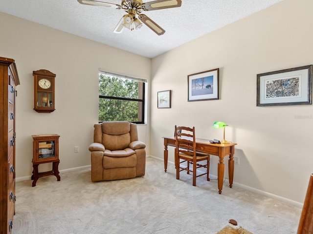 office with light carpet, a textured ceiling, and ceiling fan