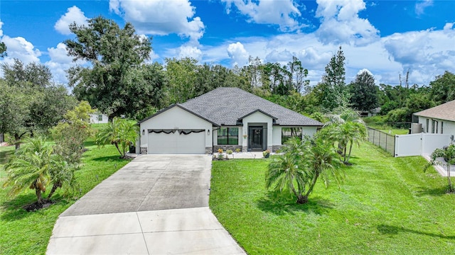 view of front facade featuring a garage and a front lawn