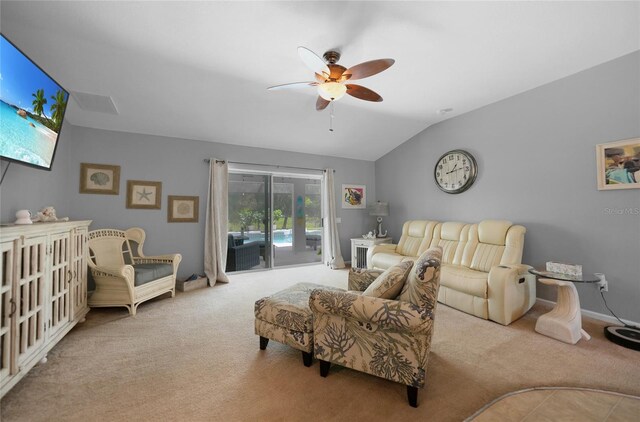 living room with light carpet, vaulted ceiling, and ceiling fan