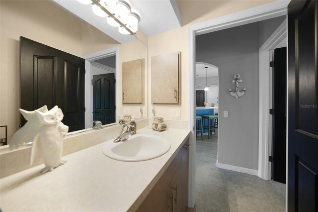 bathroom featuring tile patterned floors and vanity