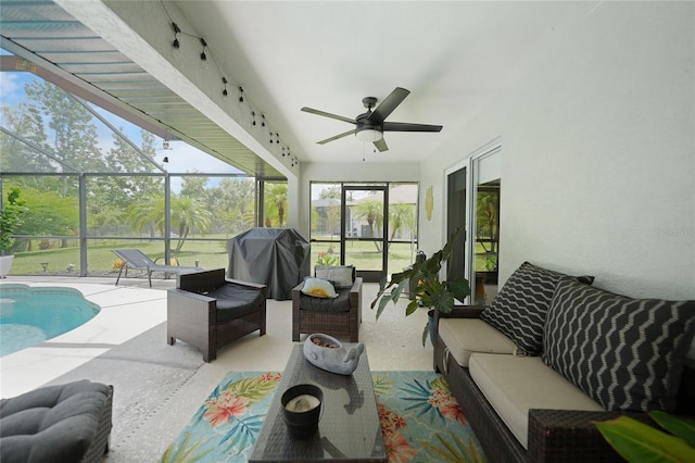 interior space featuring a pool and ceiling fan