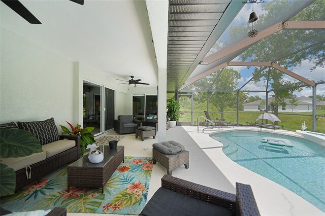 view of pool featuring a lanai, a patio, and an outdoor hangout area