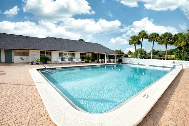 view of swimming pool featuring a patio