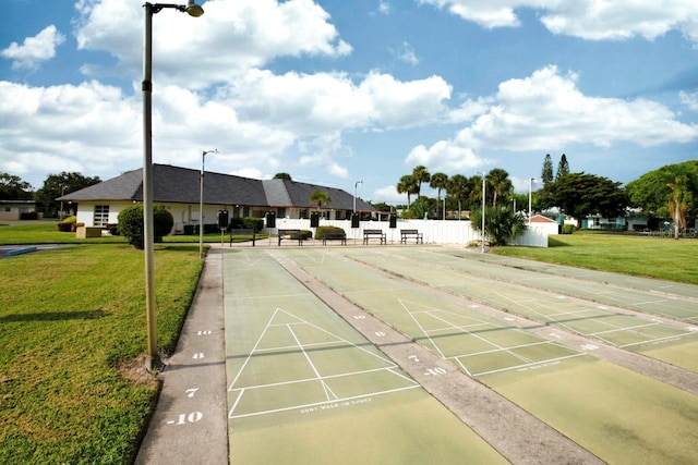 view of community with a lawn