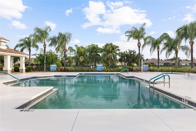 view of swimming pool featuring a patio