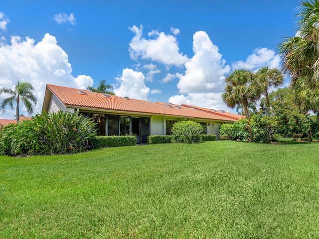 exterior space with a front yard