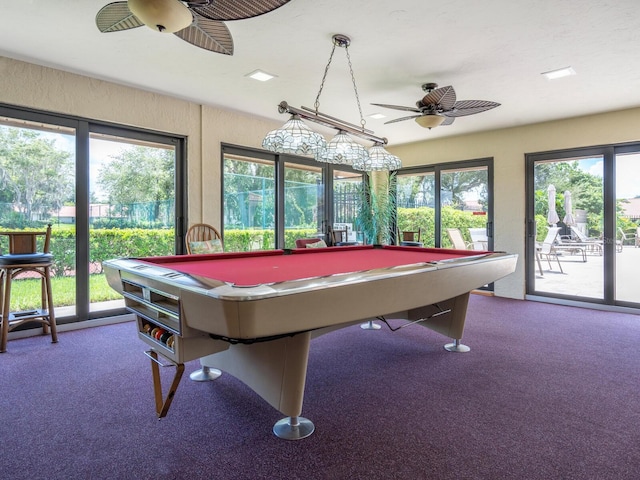 rec room featuring plenty of natural light, billiards, ceiling fan, and carpet floors