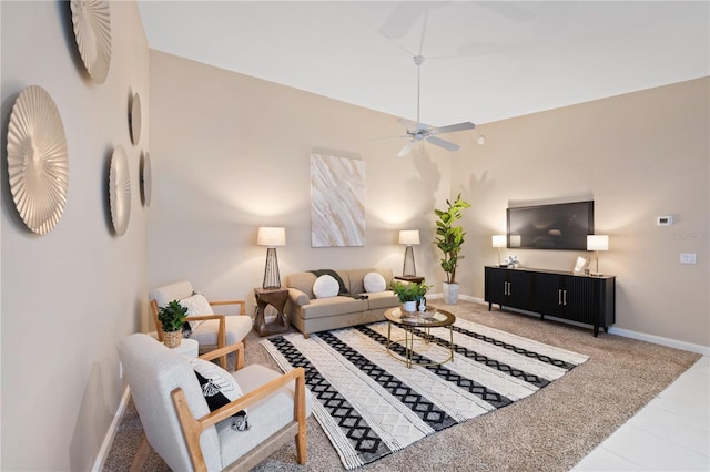 living room featuring ceiling fan and carpet floors