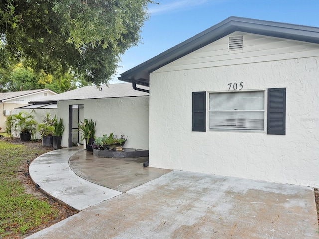 view of home's exterior featuring a patio area