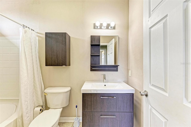 full bath with vanity, toilet, and shower / bath combo with shower curtain