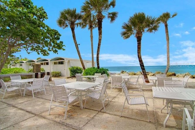 view of patio / terrace with a water view