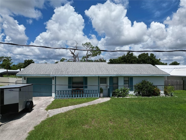 ranch-style home with covered porch and a front lawn