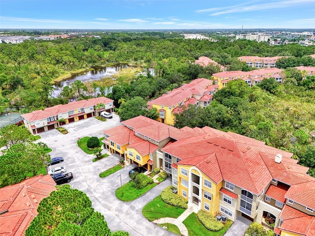 aerial view featuring a water view and a residential view