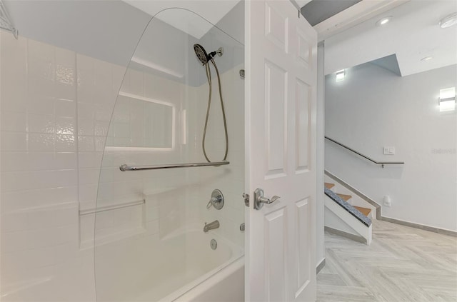 full bath with shower / tub combination and baseboards