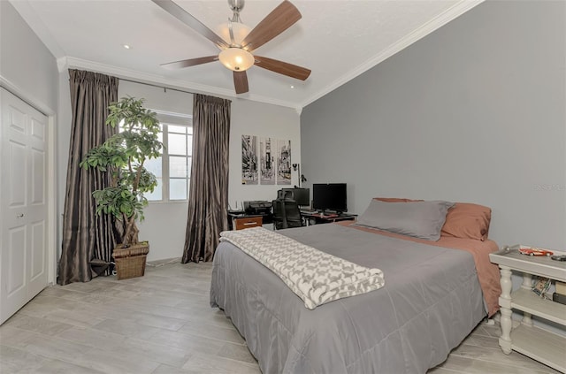 bedroom with ceiling fan and crown molding