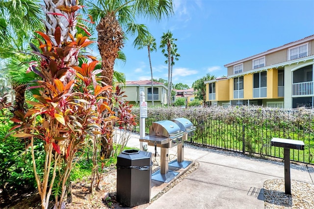 view of patio / terrace featuring grilling area and fence