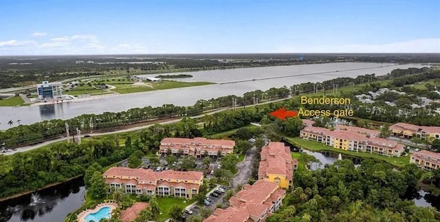 birds eye view of property featuring a water view