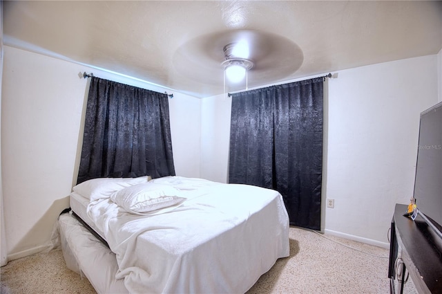 bedroom featuring ceiling fan