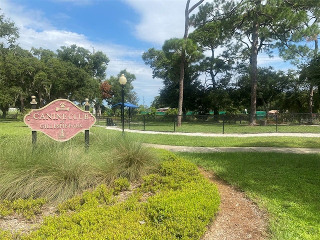 surrounding community featuring a yard