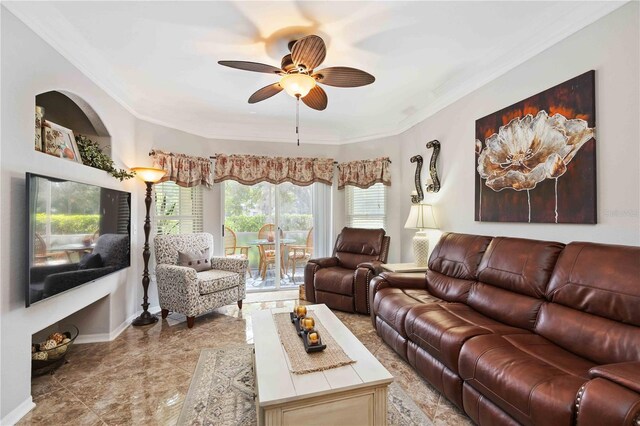 tiled living room featuring ceiling fan and ornamental molding