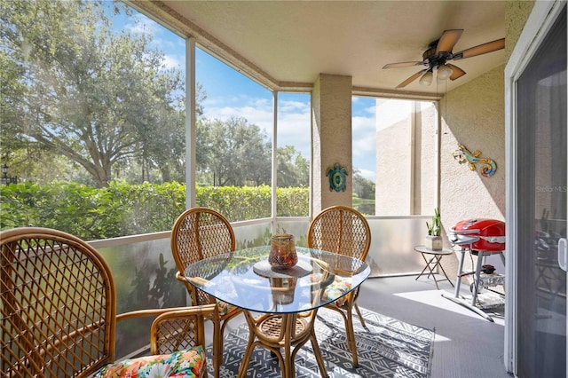 sunroom / solarium with ceiling fan