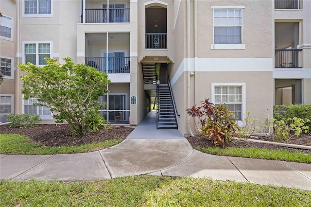 view of property with stairway