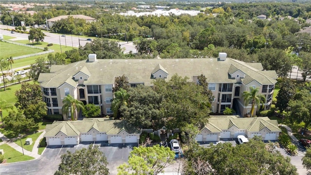 birds eye view of property with a residential view