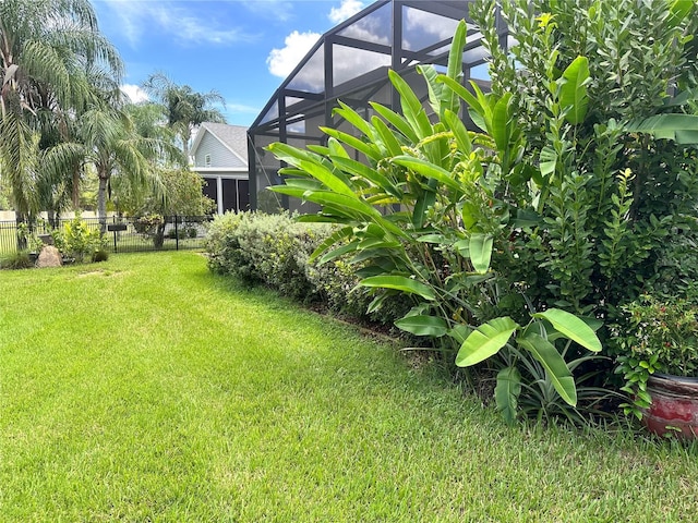 view of yard with a lanai