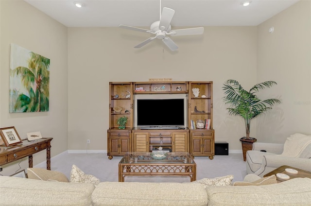 living room with light carpet, recessed lighting, a ceiling fan, and baseboards