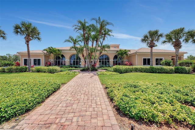 view of front of house with a front yard