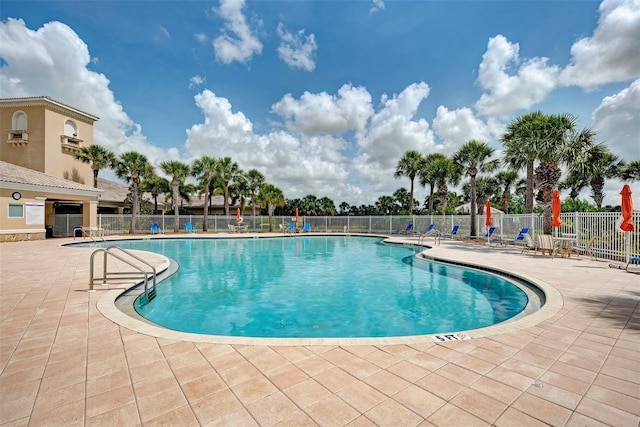 view of pool featuring a patio area