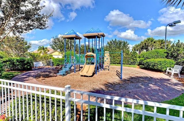 community playground featuring fence