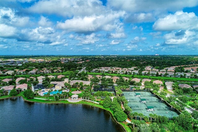 bird's eye view featuring a water view and a residential view