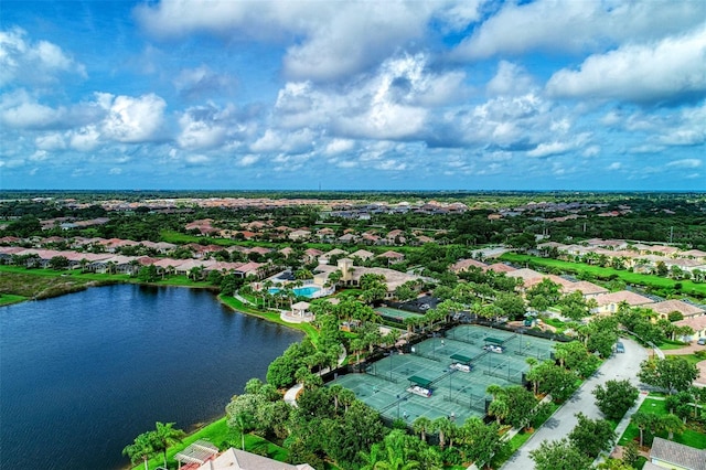 birds eye view of property featuring a water view and a residential view