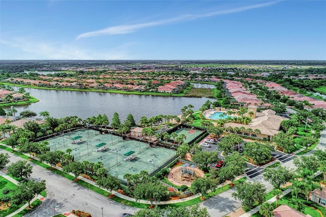 birds eye view of property featuring a residential view and a water view